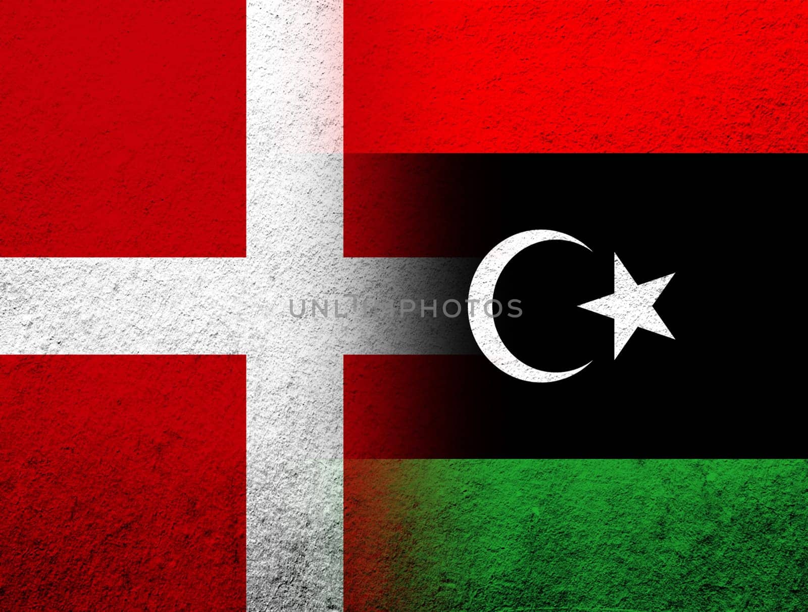 the Kingdom of Denmark National flag with The State of Libya National flag. Grunge Background