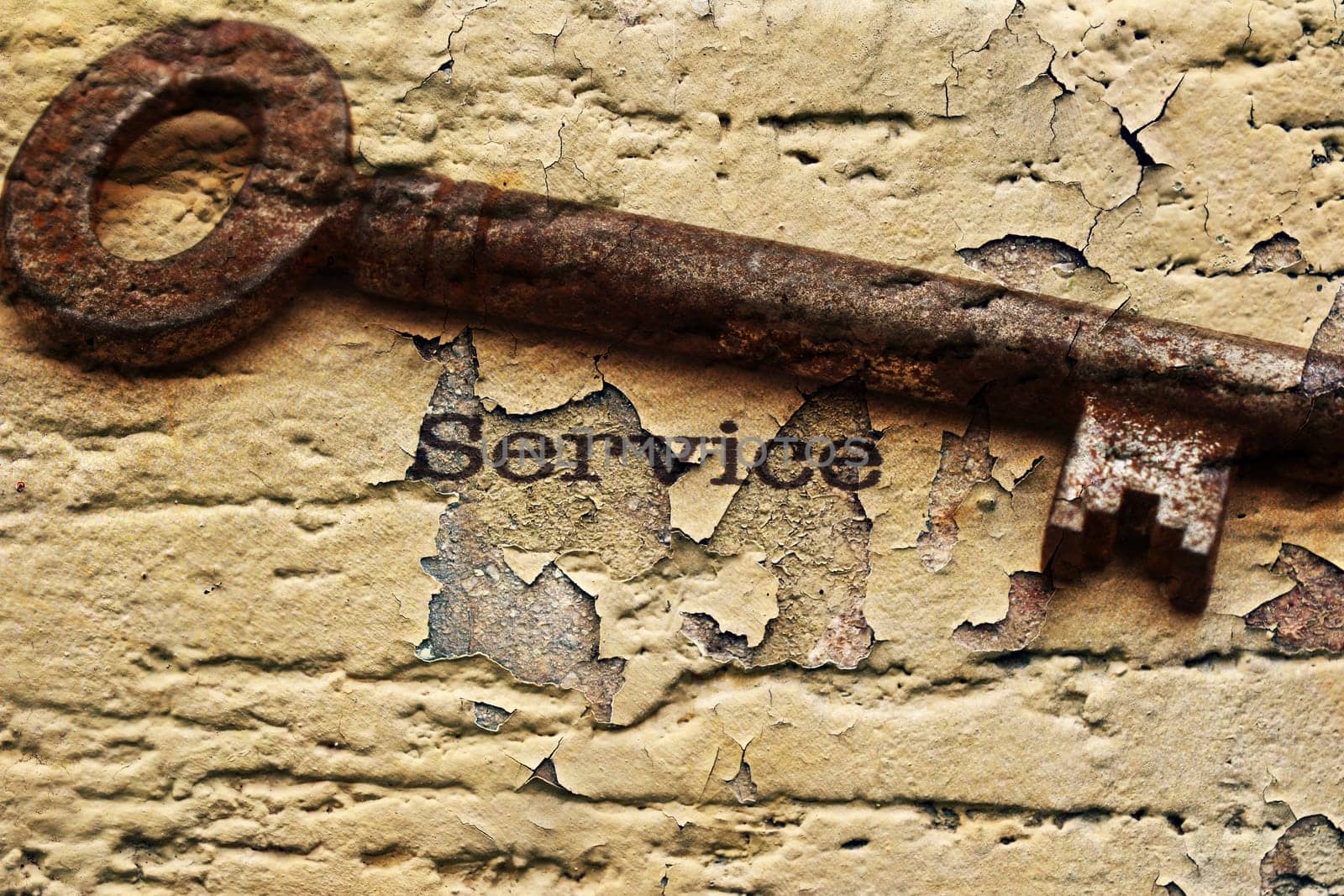 Old key on service text grunge concept