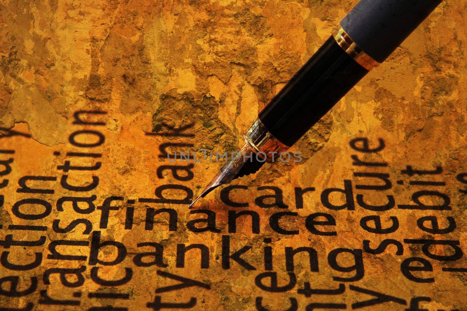 Fountain pen on finance and banking text