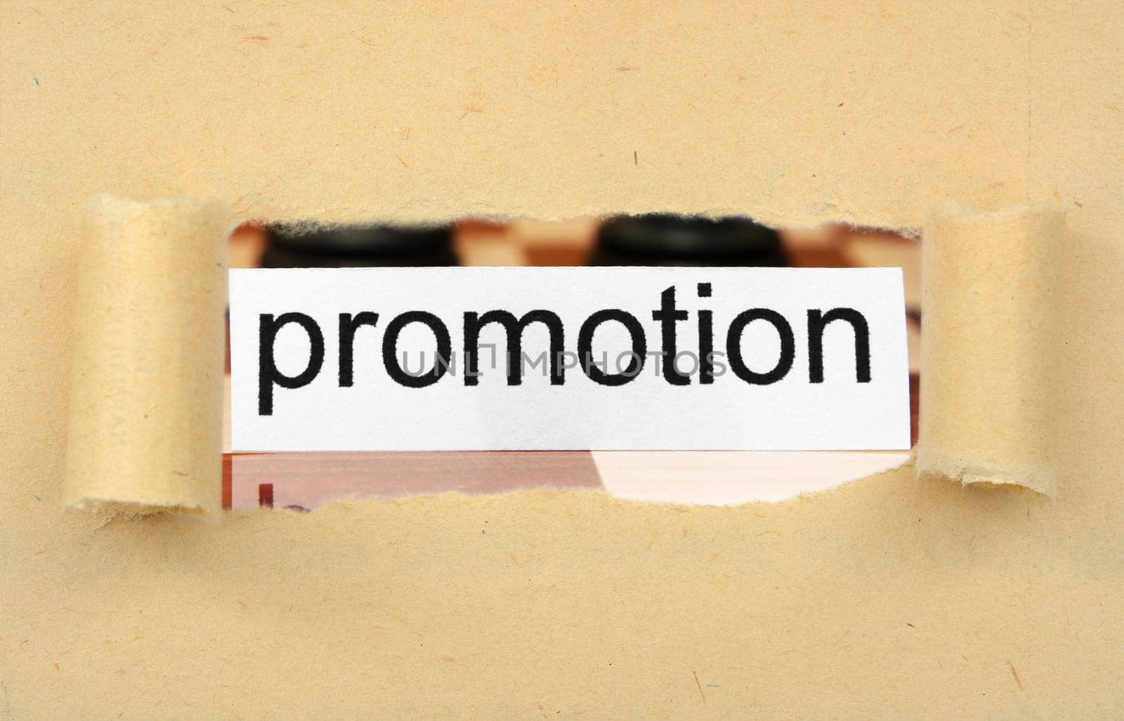 Promotion tag on ripped paper