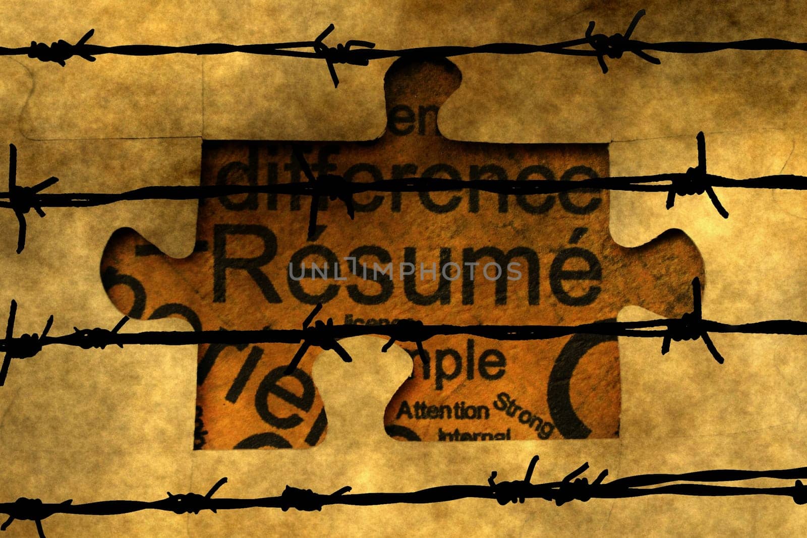 Resume puzzle concept against barbwire