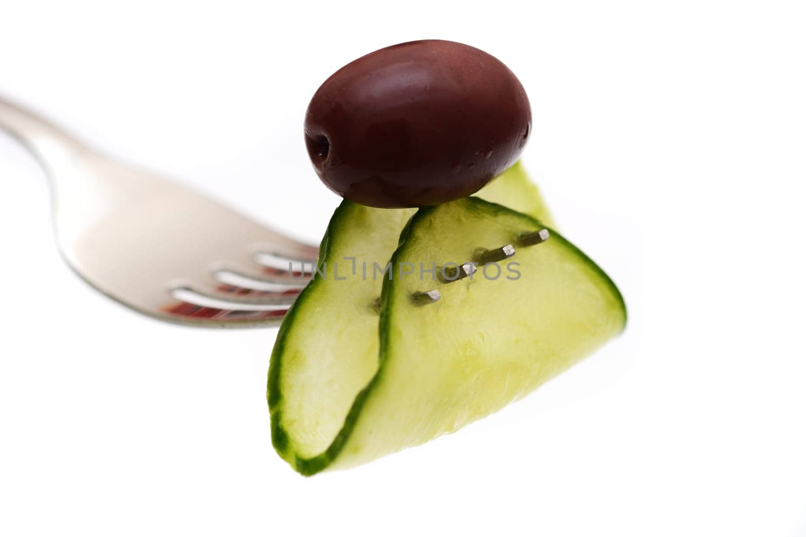 Cucumber on fork