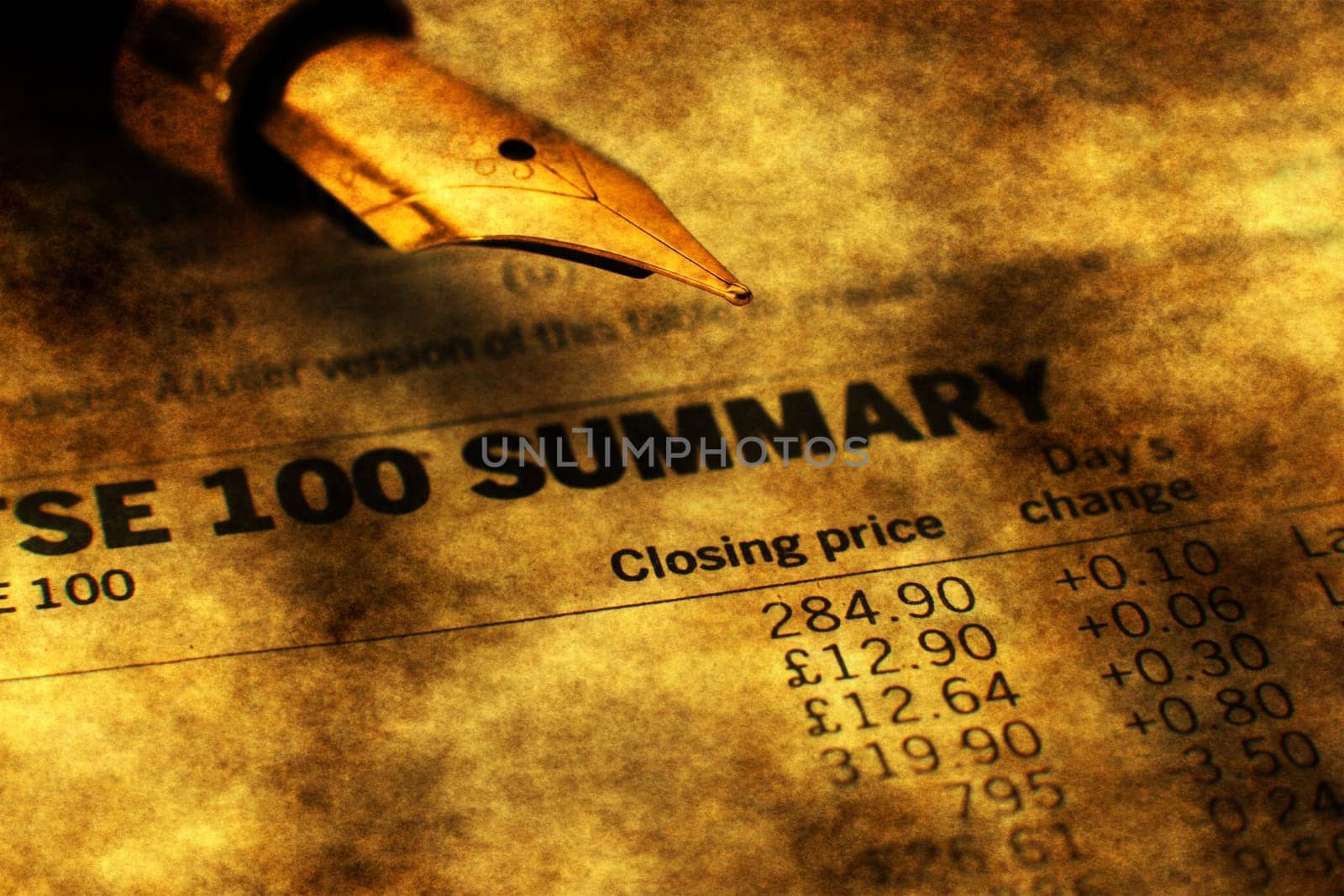 Fountain pen on stock market report