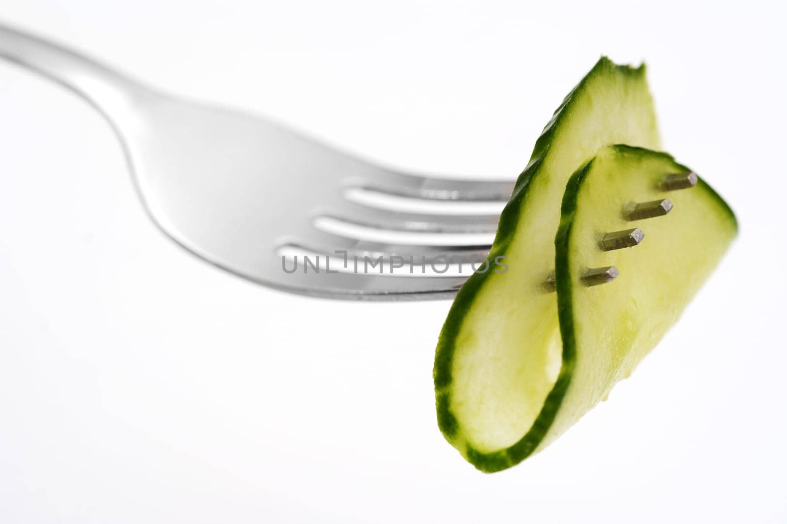 Cucumber on fork