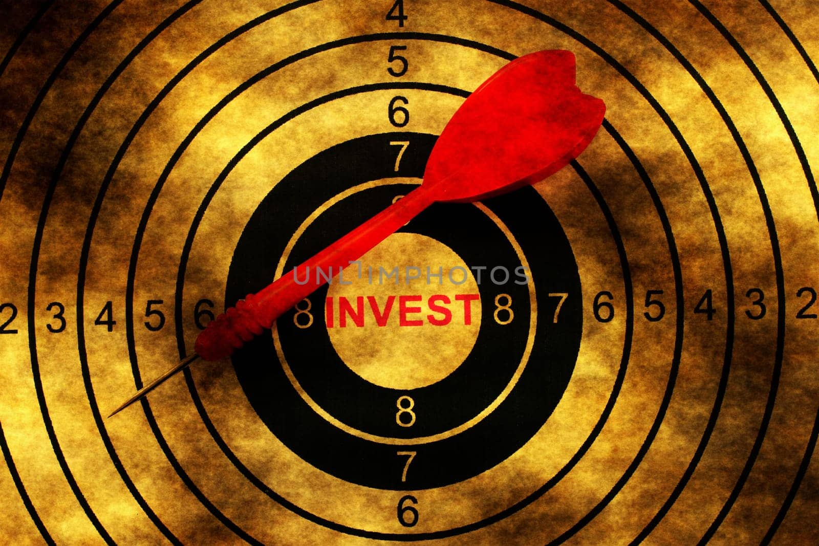 Invest target on grunge background