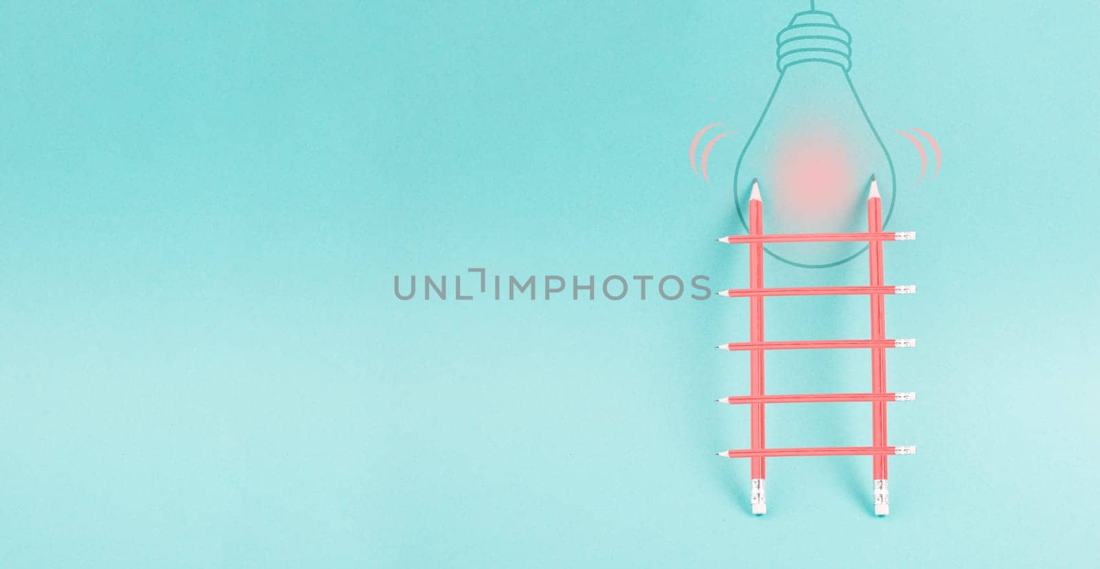 Ladder of success, having an idea, marketing and business concept, brainstorming for new goals, light bulb on wall