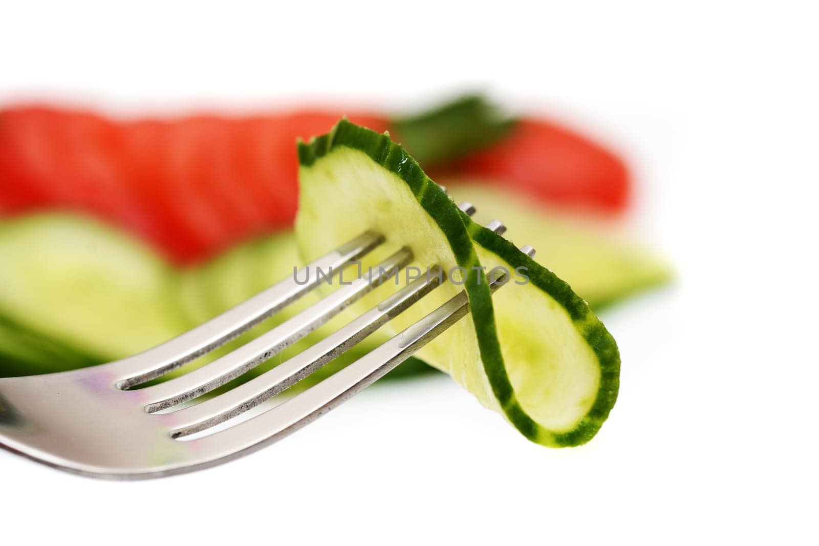 Cucumber slice on fork
