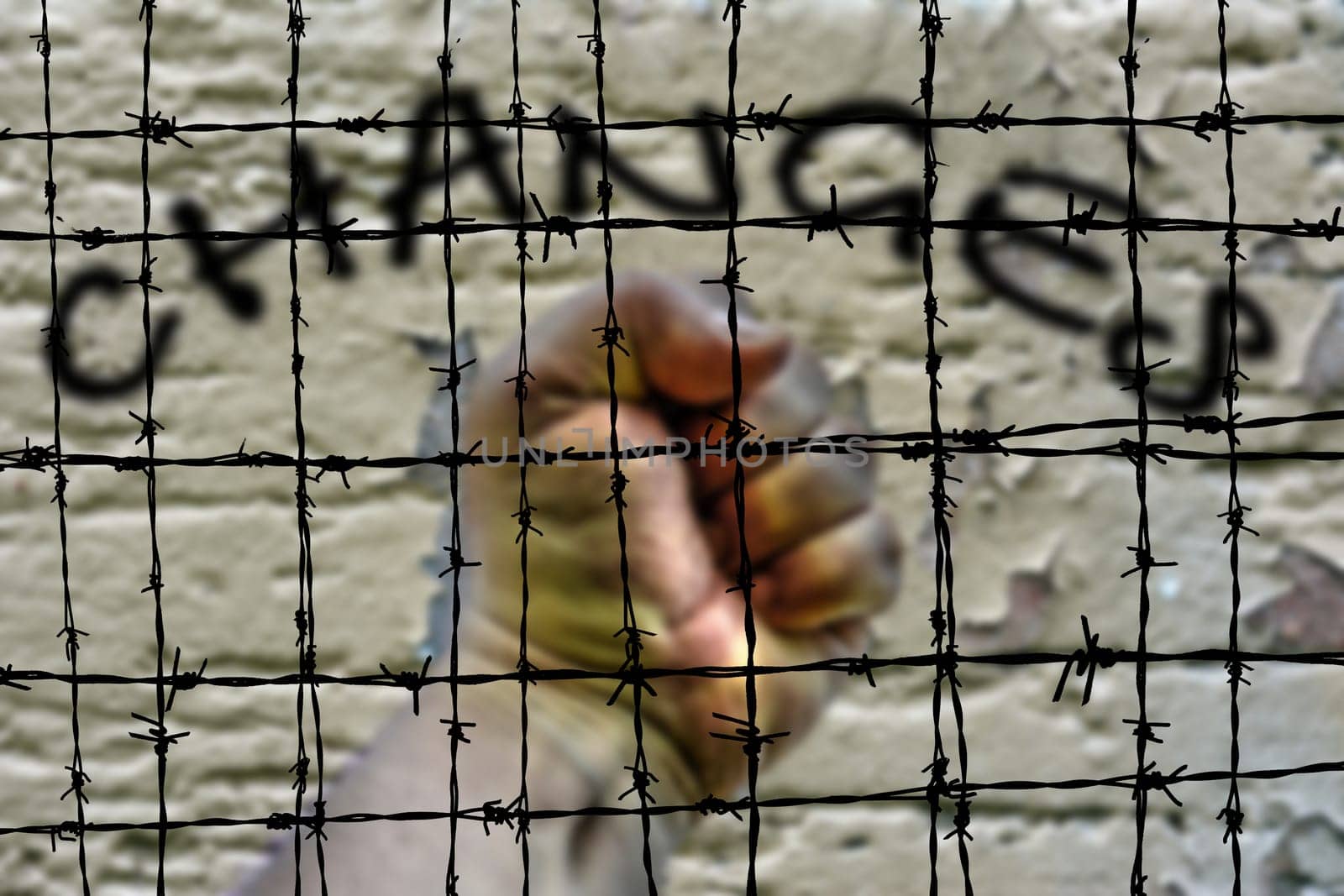 Changes and hand against Barbwire