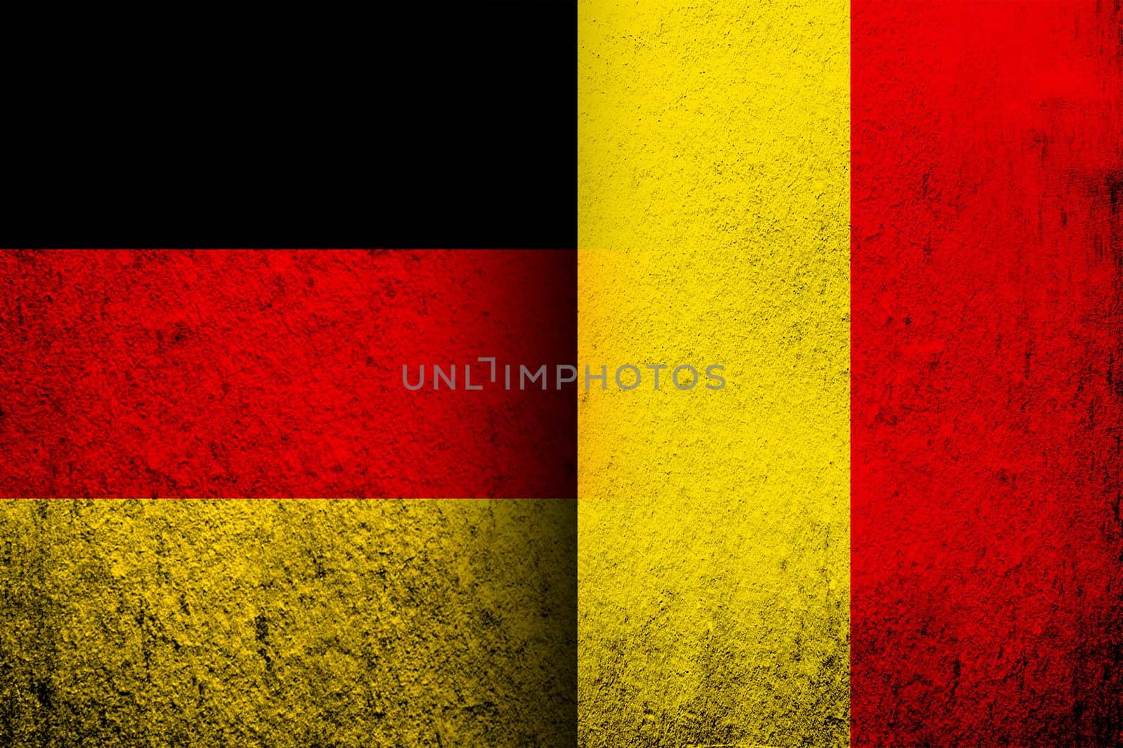 The national flag of Germany with Kingdom of Belgium National flag. Grunge background