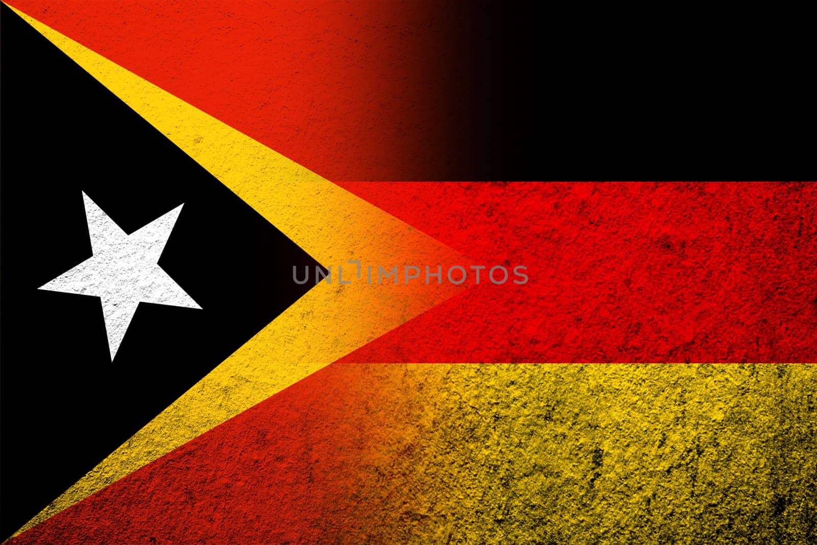 The national flag of Germany with East Timor National flag. Grunge background