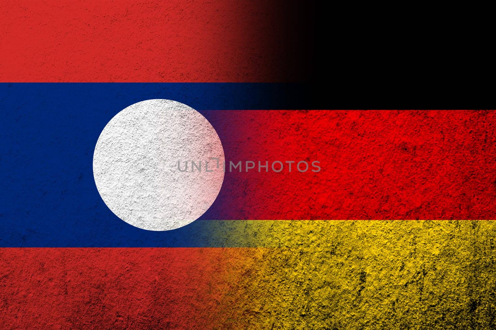 The national flag of Germany with Laos National flag. Grunge background