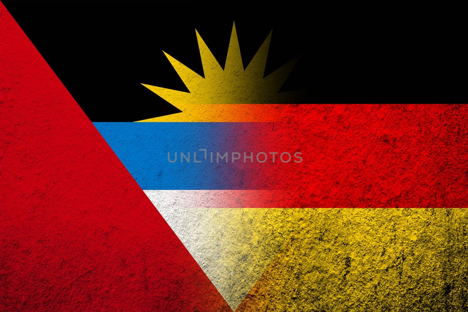 The national flag of Germany with National flag of Antigua and Barbuda. Grunge background