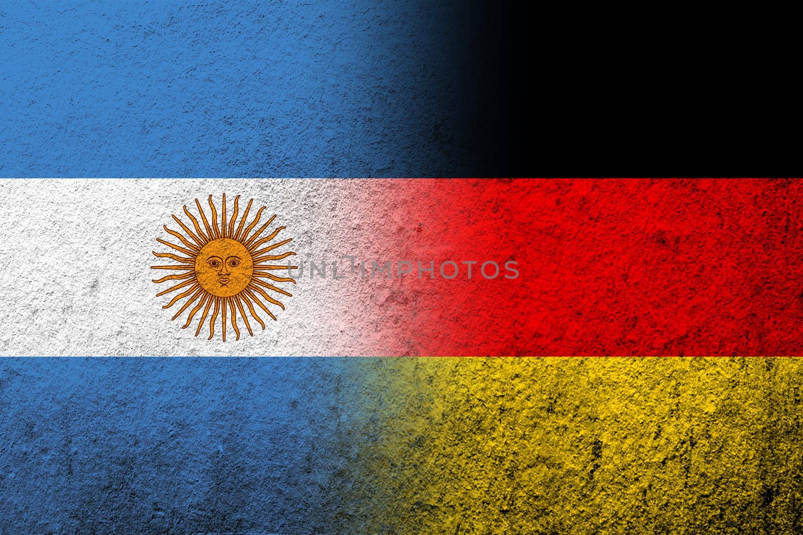 The national flag of Germany with National flag of Argentina. Grunge background