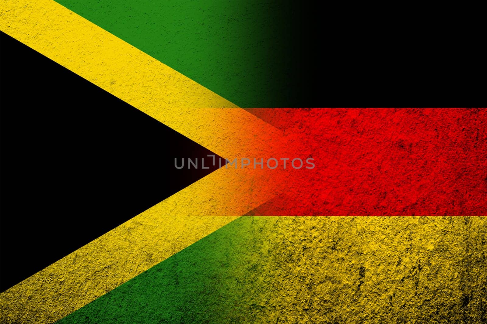 The national flag of Germany with National flag of Jamaica. Grunge background