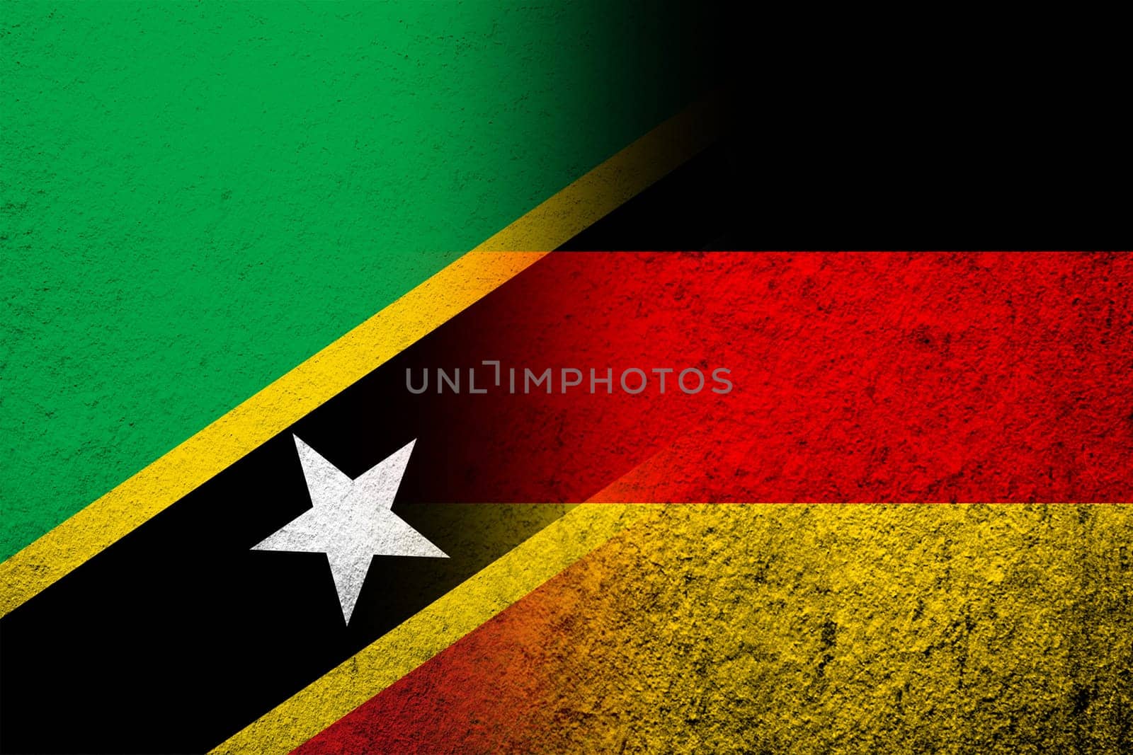The national flag of Germany with Saint Kitts and Nevis National flag. Grunge background