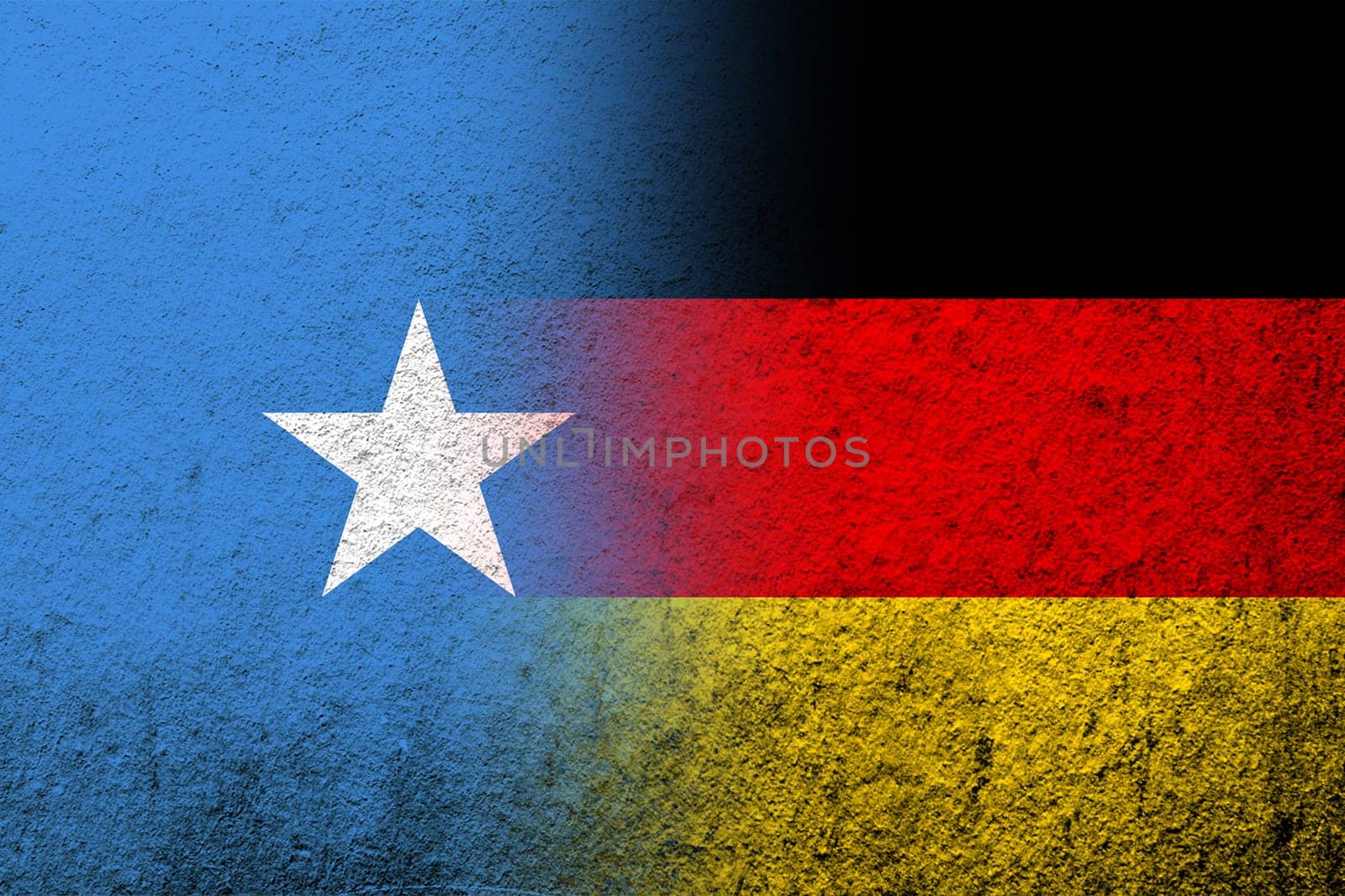 The national flag of Germany with Republic of Somalia National flag. Grunge background