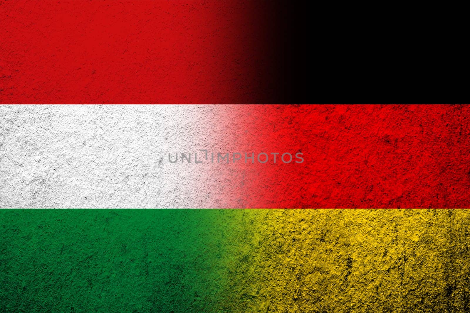 The national flag of Germany with National flag of Hungary. Grunge background