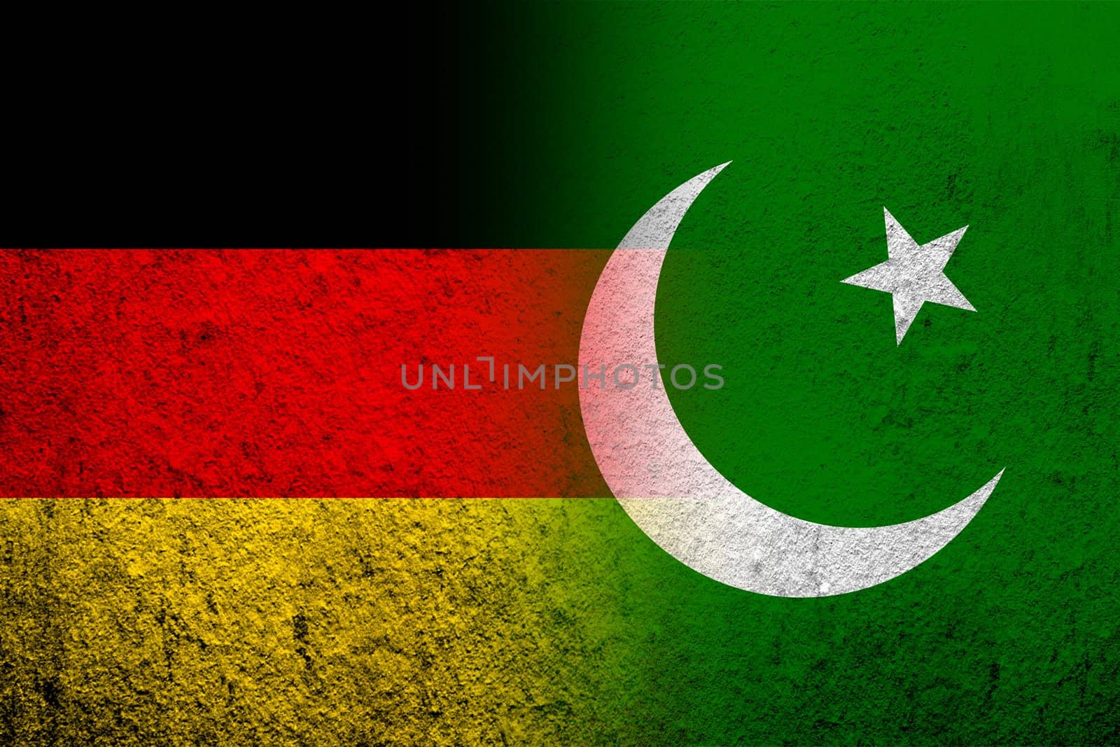 The national flag of Germany with Republic of Pakistan National flag. Grunge background