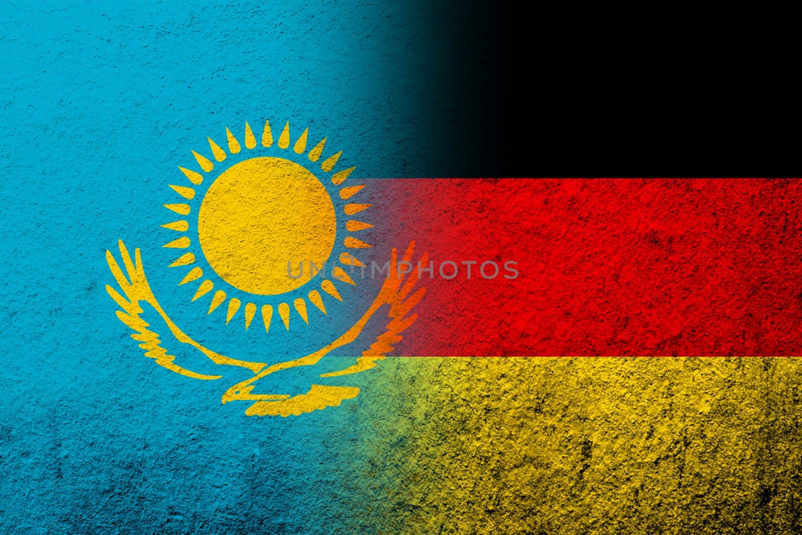 The national flag of Germany with The Republic of Kazakhstan National flag. Grunge background