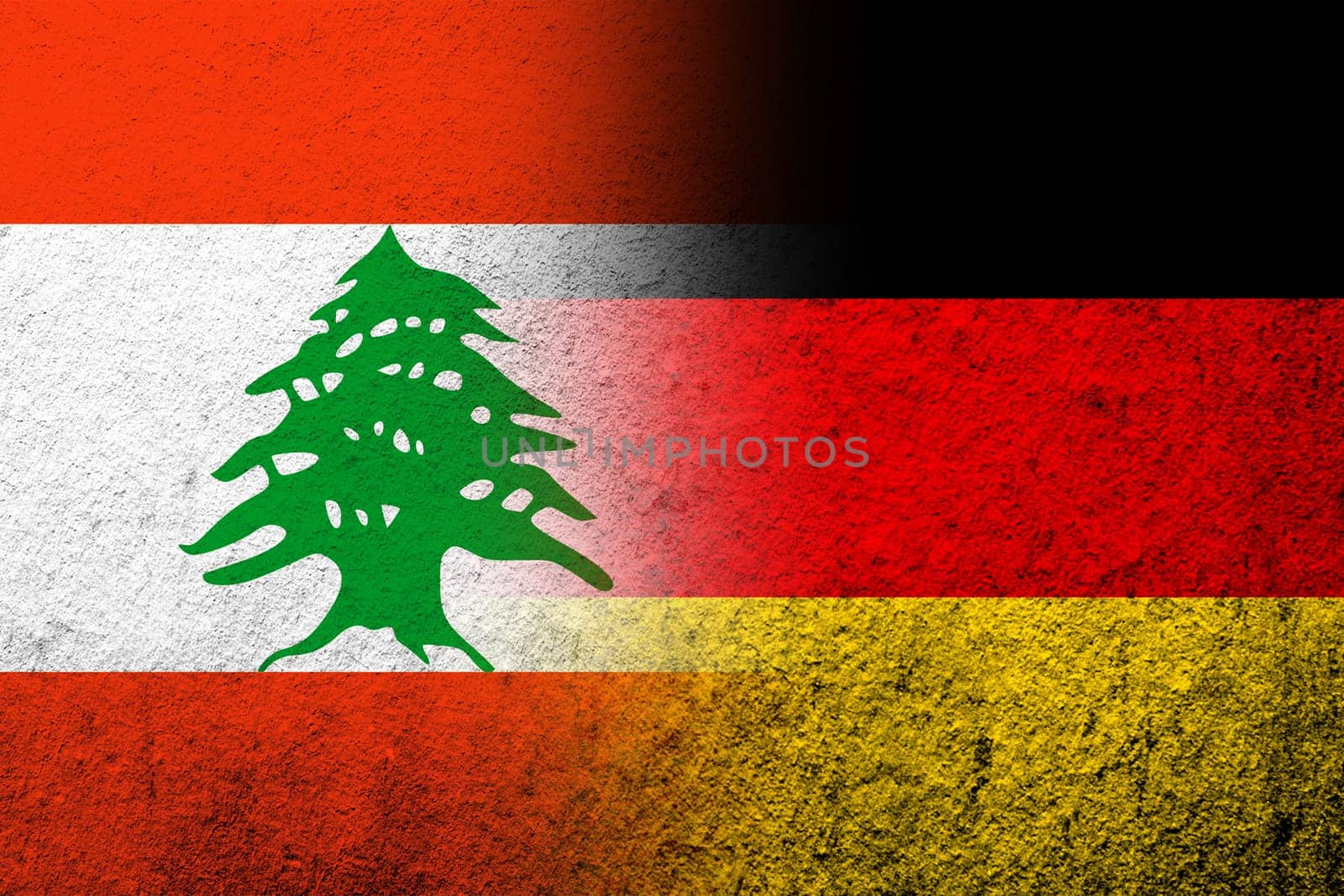 The national flag of Germany with The Lebanese Republic Lebanon National flag. Grunge background