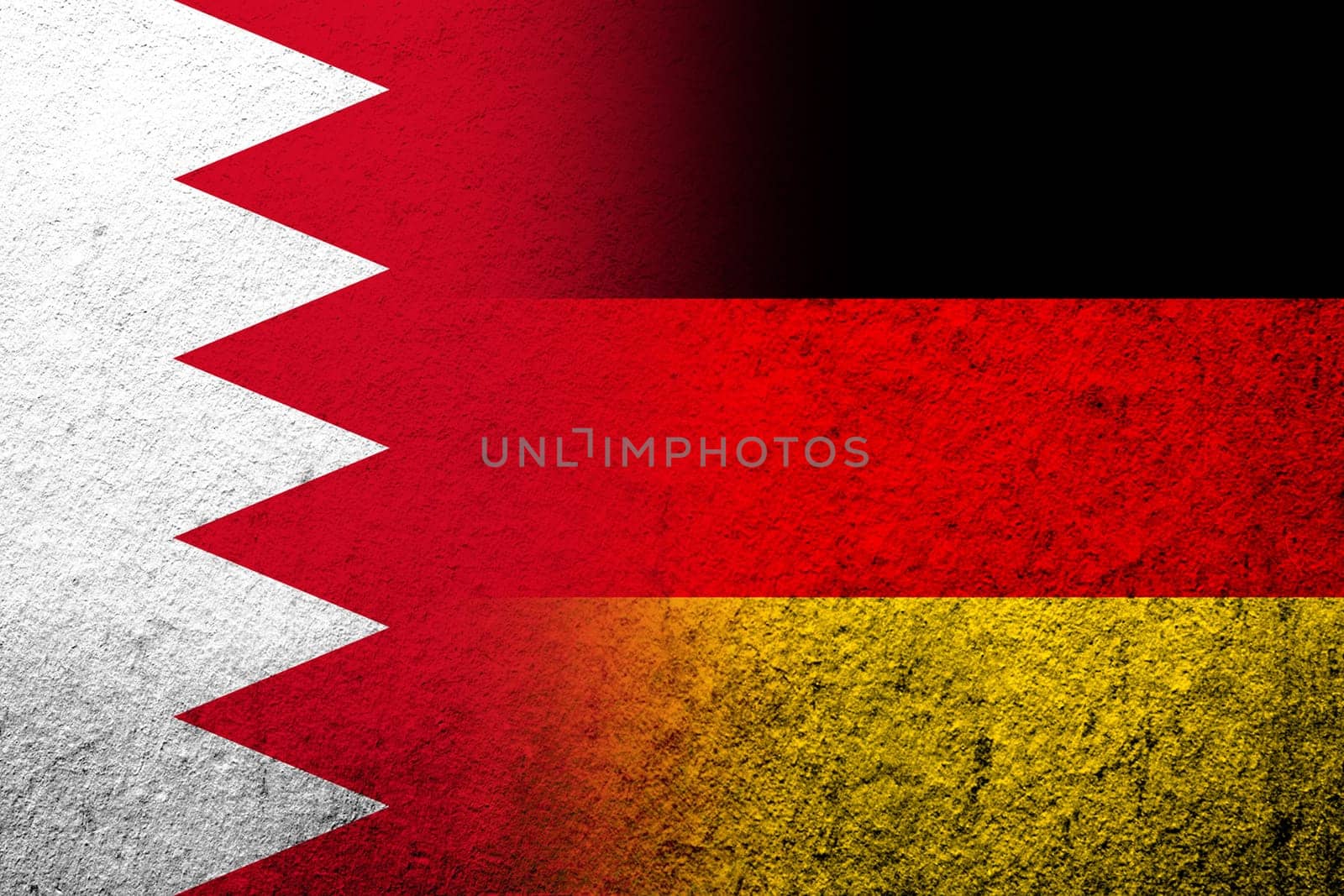 The national flag of Germany with The Kingdom of Bahrain national flag. Grunge background