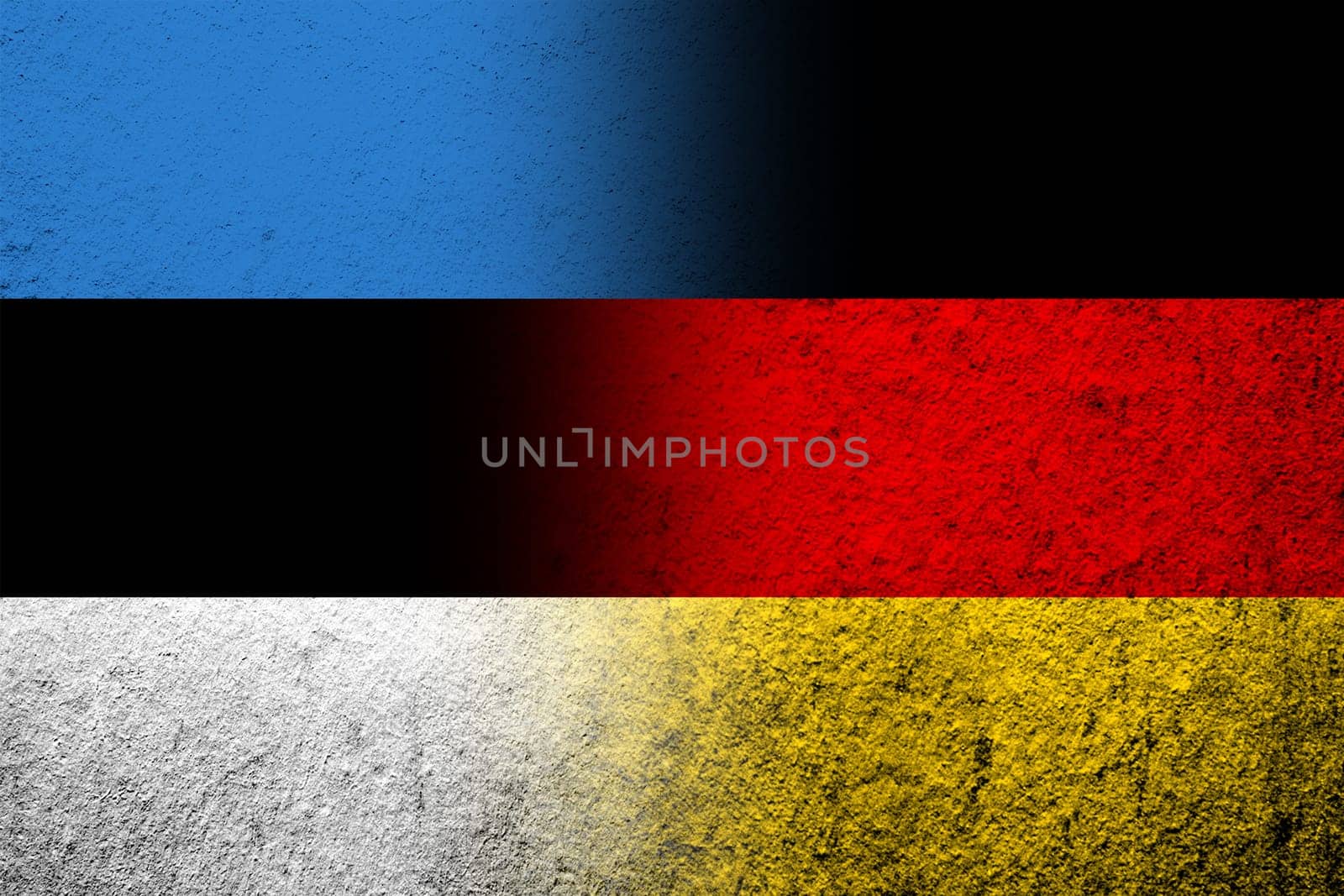 The national flag of Germany with The Republic of Estonia national flag. Grunge background