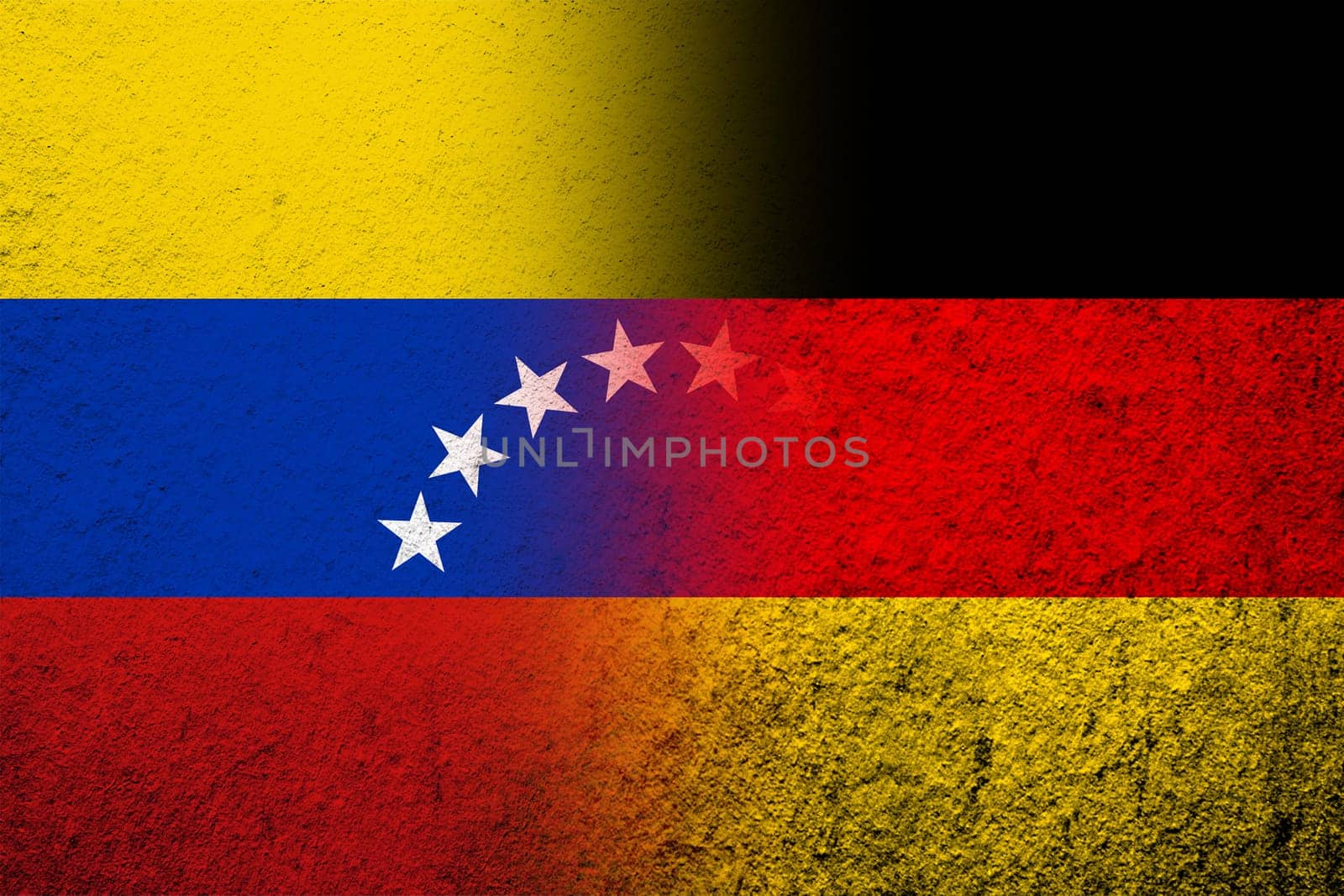 The national flag of Germany with The Bolivarian Republic of Venezuela National flag. Grunge background