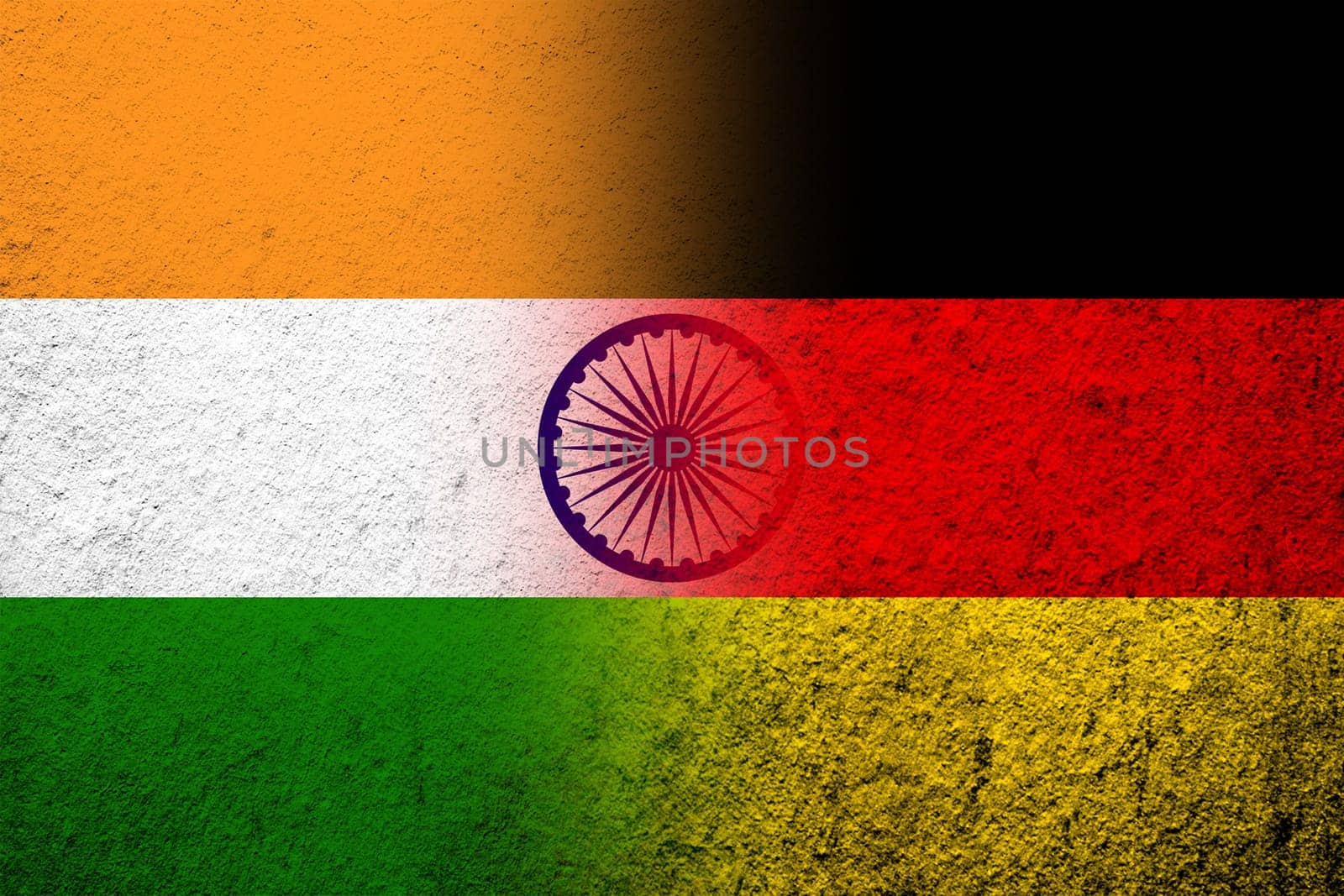 The national flag of Germany with The Republic of India National flag. Grunge background