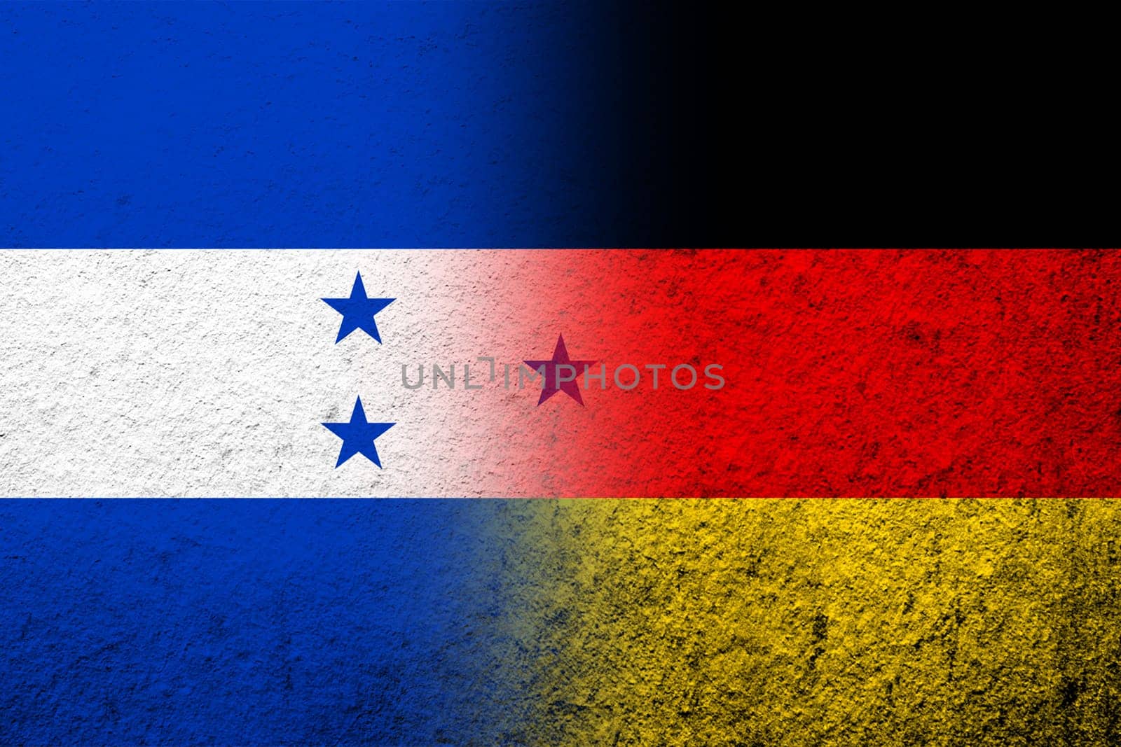 The national flag of Germany with The Republic of Honduras National flag. Grunge background