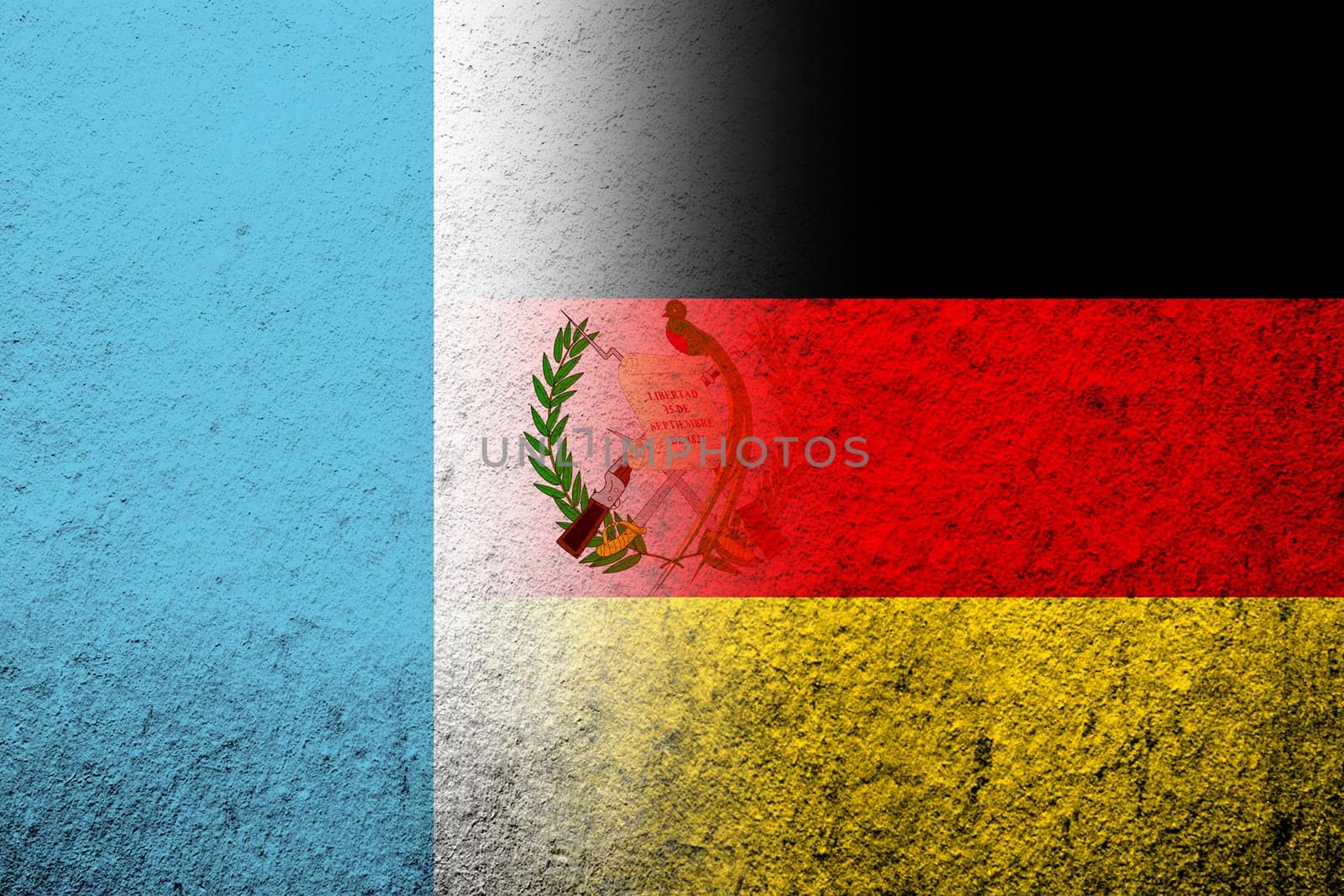 The national flag of Germany with The Republic of Guatemala National flag. Grunge background