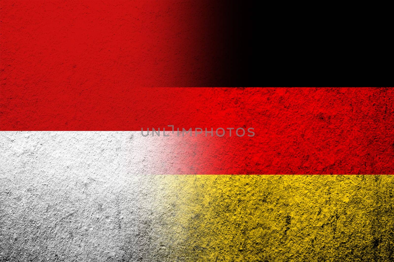 The national flag of Germany with The Republic of Indonesia National flag. Grunge background