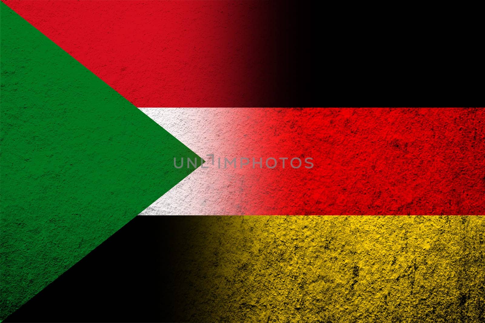 The national flag of Germany with the Republic of the Sudan National flag. Grunge background