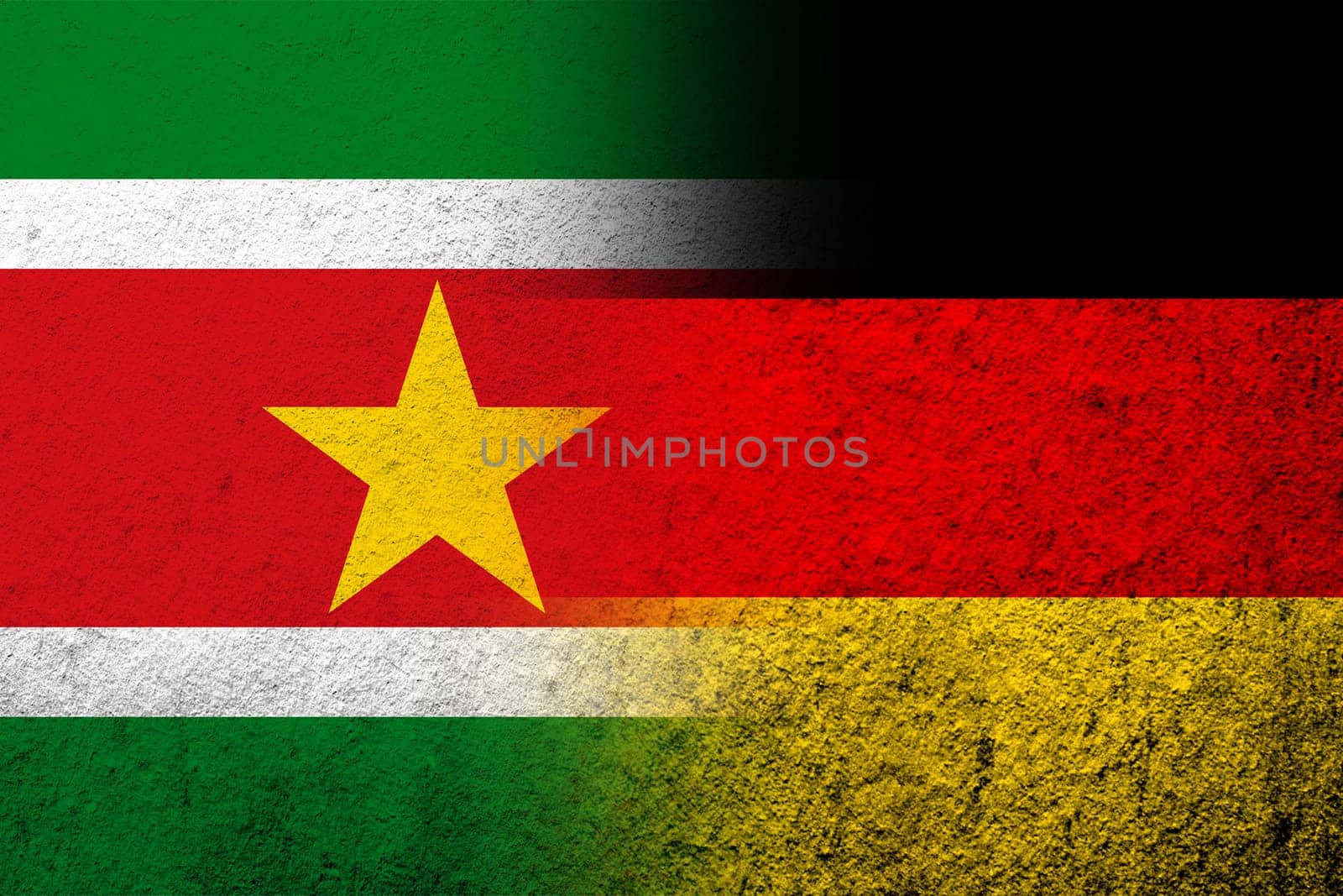 The national flag of Germany with The Republic of Suriname National flag. Grunge background
