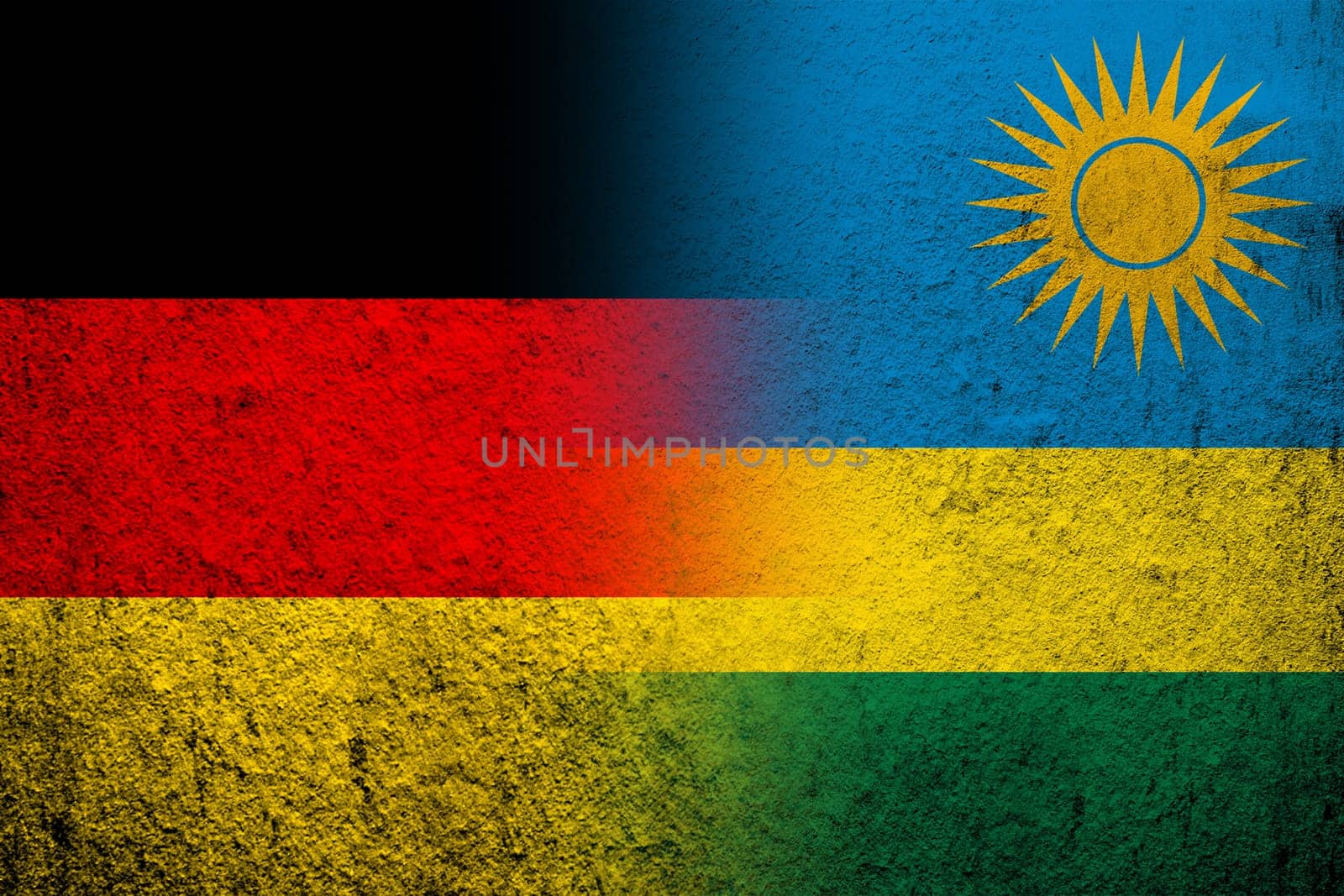 The national flag of Germany with the Republic of Rwanda National flag. Grunge background