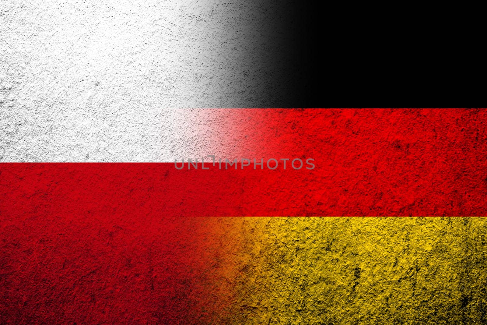 The national flag of Germany with The Republic of Poland national flag. Grunge background