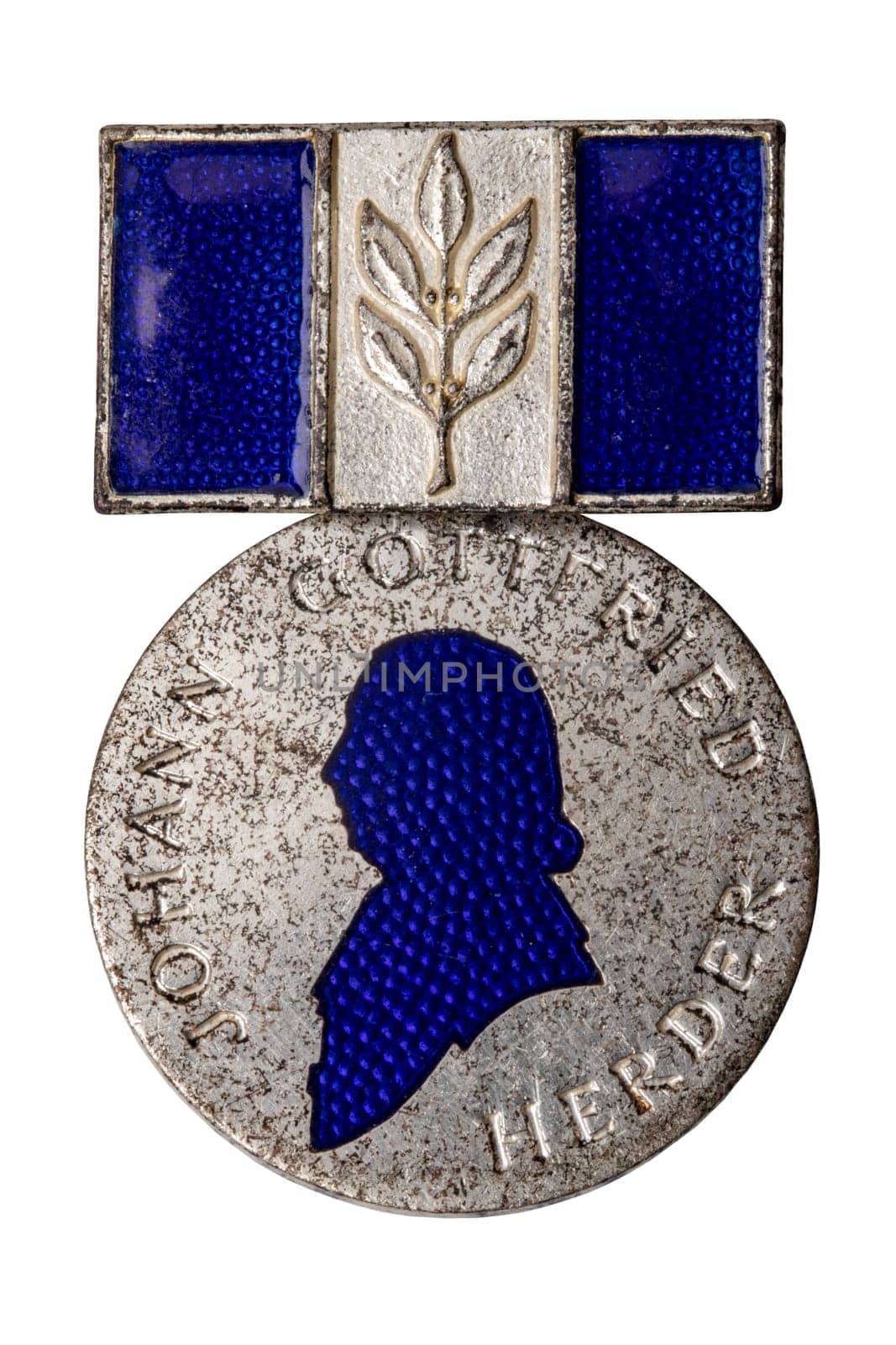 Potsdam, Germany - MAY 06, 2022. Close-up of an old medal by Johann Gottfried Herder. Ca. 1958. Poet, theologian, philosopher. Clipping path. Awarded to meritorious Russian teachers in GDR.