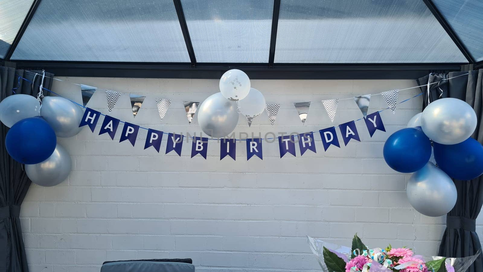Celebration banner. Happy birthday party background with golden ribbons, confetti and balloons. Realistic anniversary