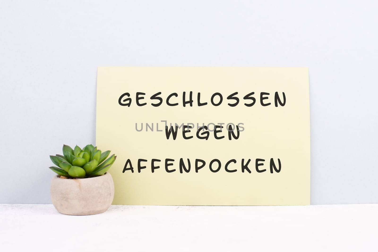 The words closed due to monkeypox are standing on a sign, german language, outbreak of the MPXV virus pandemic, infectious disease spreading