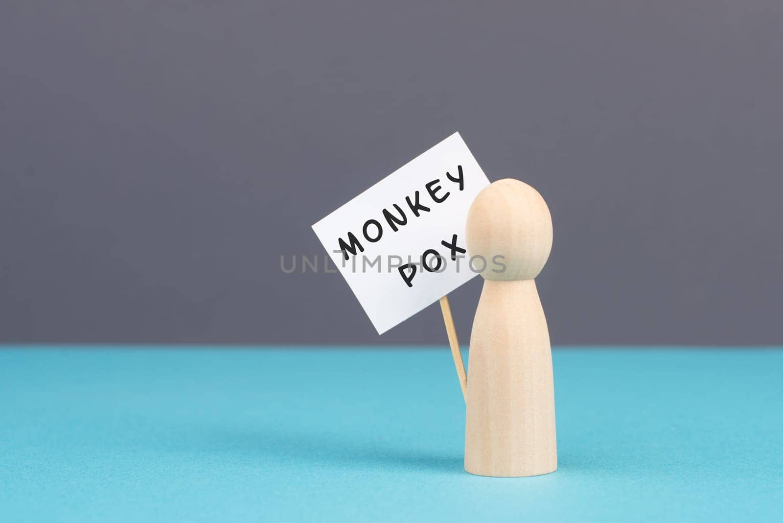 The word monkeypox is standing on a sign, outbreak of the MPXV virus pandemic, infectious disease spreading