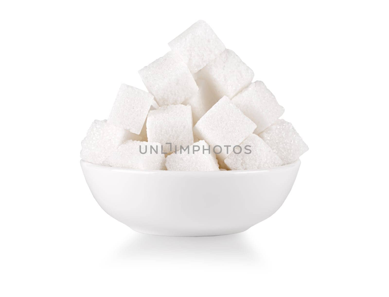The Cubes of sugar isolated on the white background