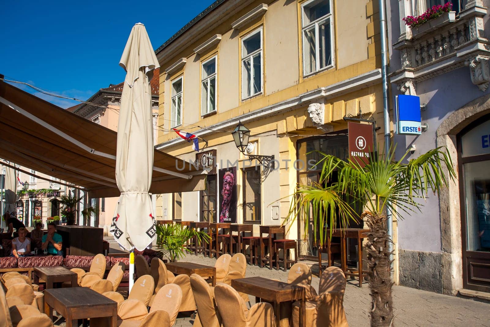 SAMOBOR, CROATIA-May 22, 2022: The City center of Samobor, with its church in the background, is a tourist attraction because of a ruined castle on a nearby hill.