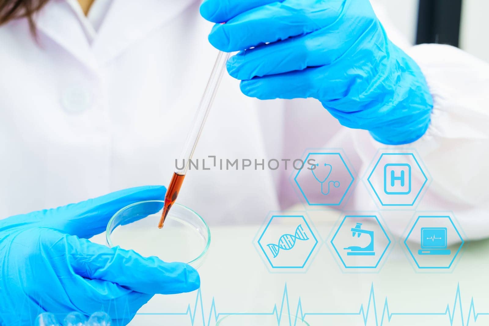 Technician scientist analyzing holding blood sample in test tube in laboratory for testing it on  COVID-19, coronavirus virus analysis