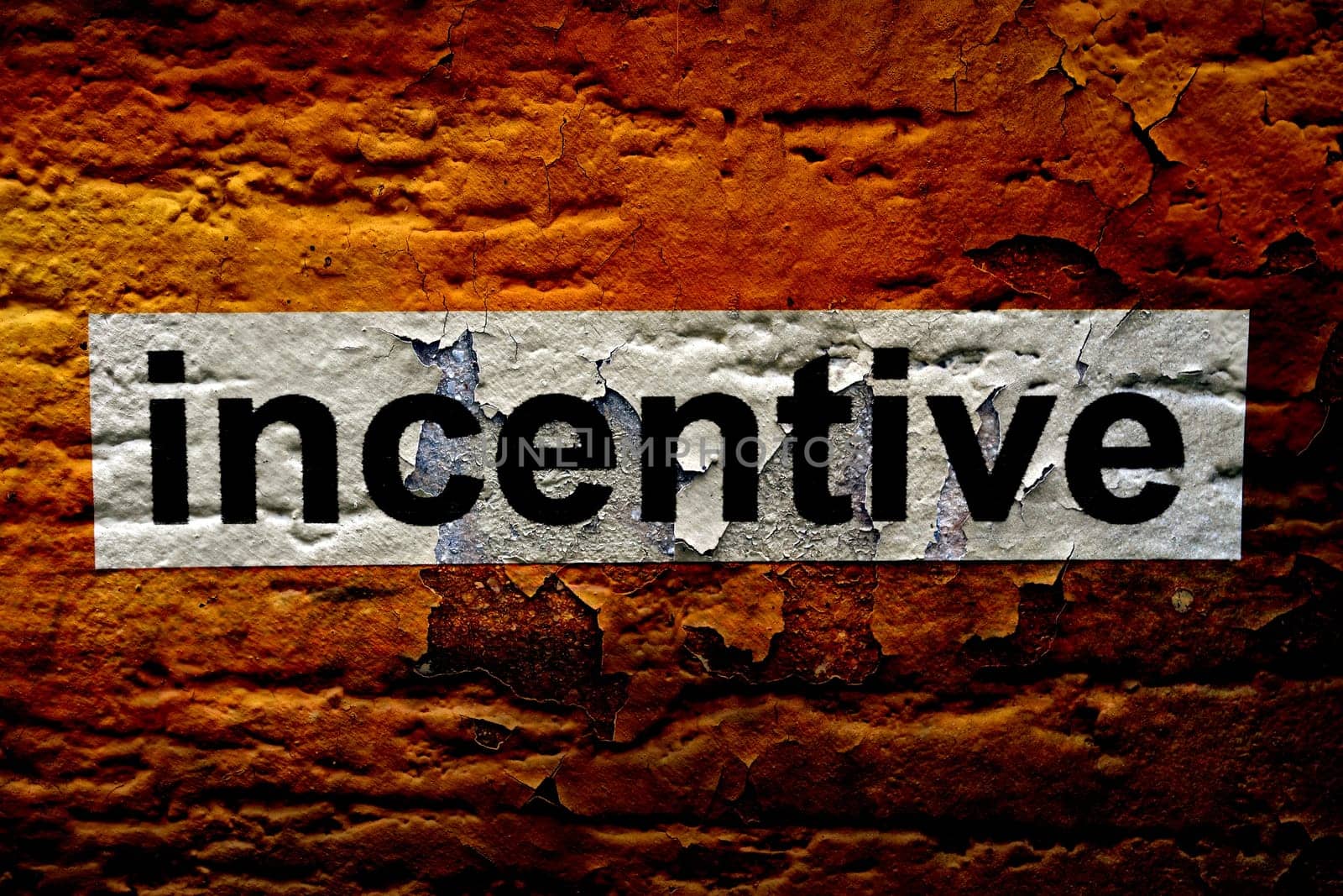 Incentive text on grunge background