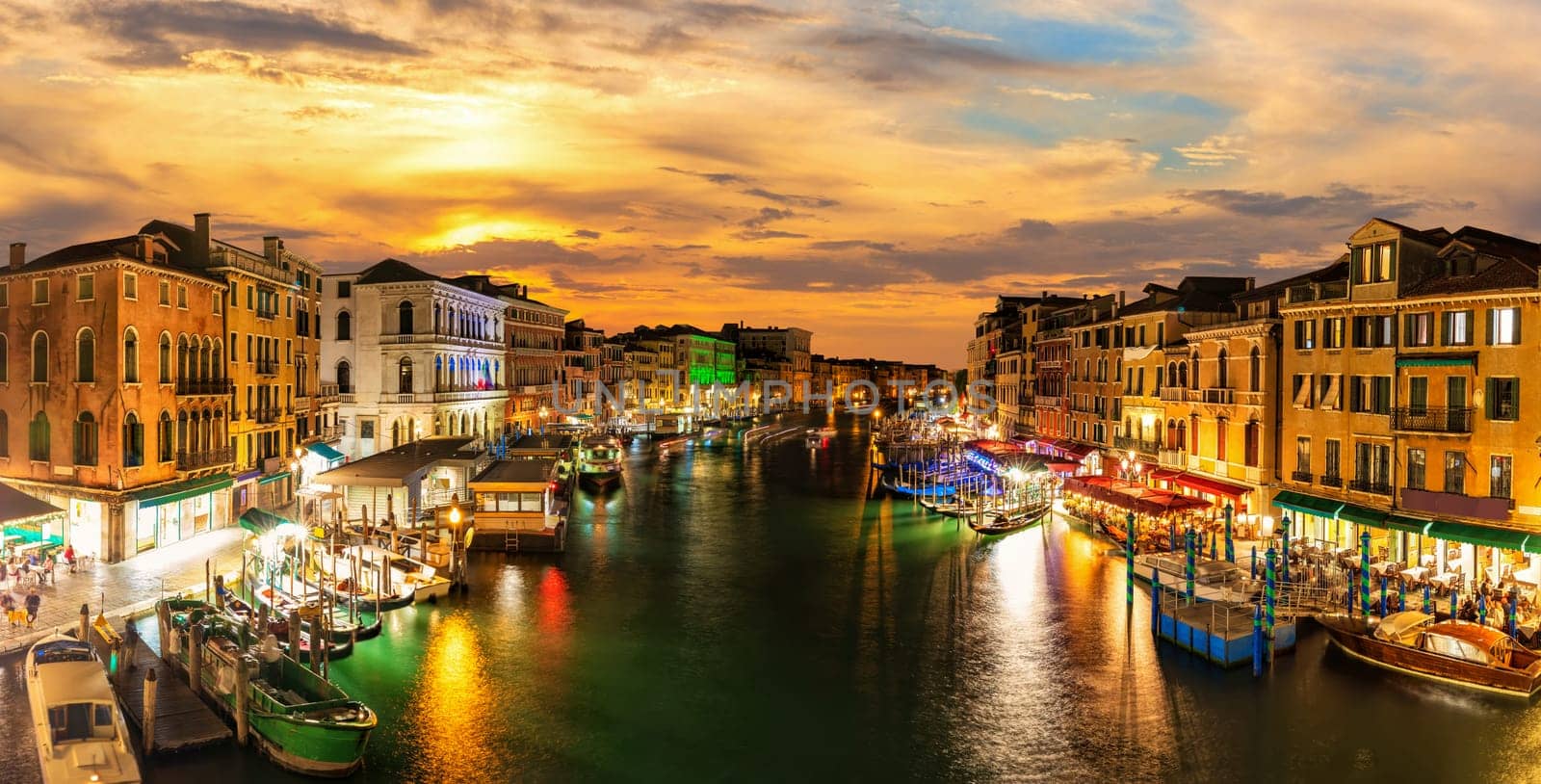 The Grand Canal buildings in twilight, view from Rialto Bridge, famous landmark of Venice, Italy.