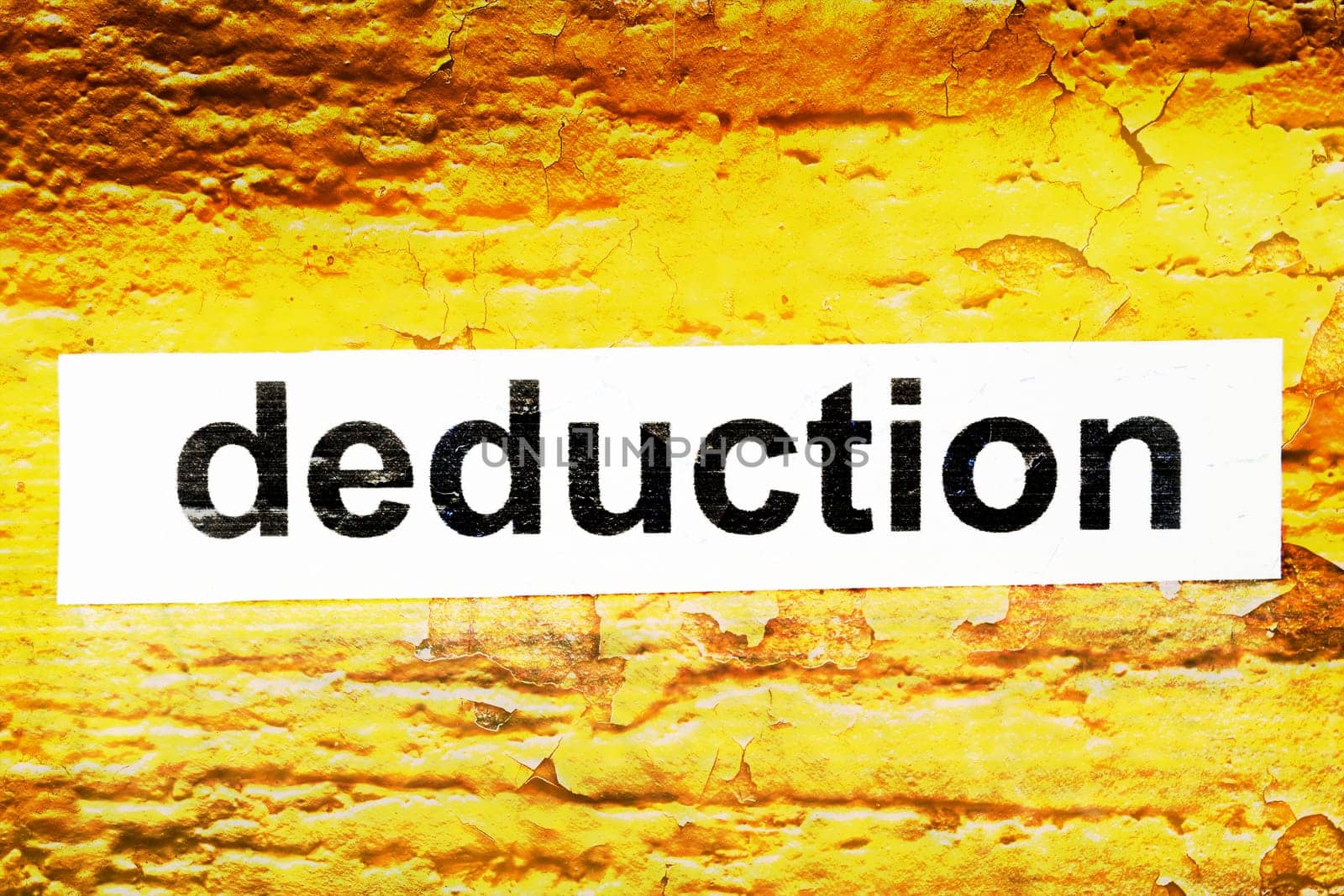 Deduction text on grunge background