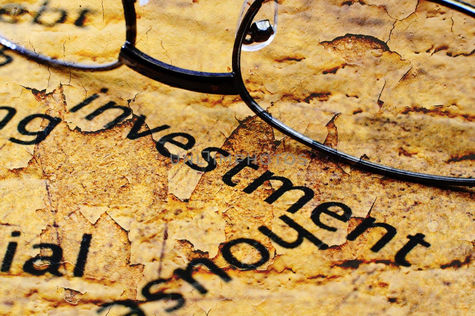 Investment text on grunge background