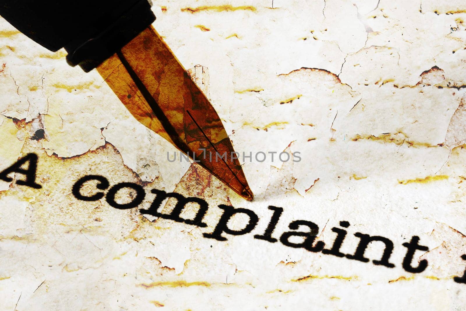 Fountain pen on complaint text