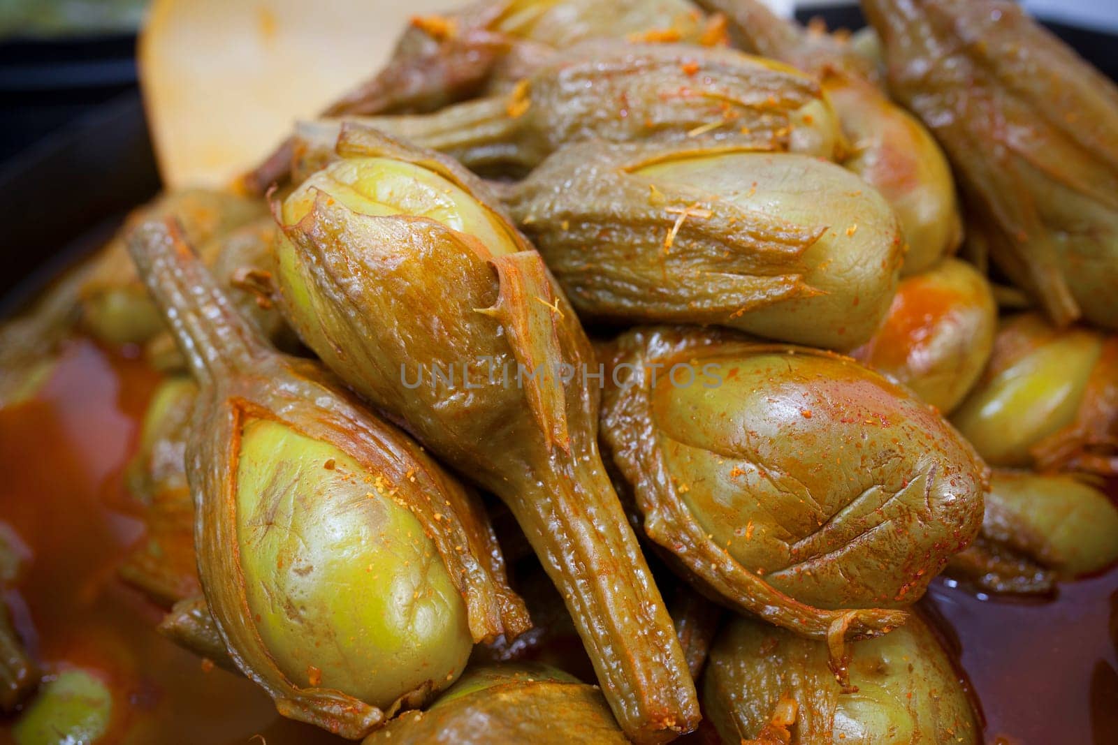 Almagro pickled eggplants. Delicious pickled snack displayed plastic basket