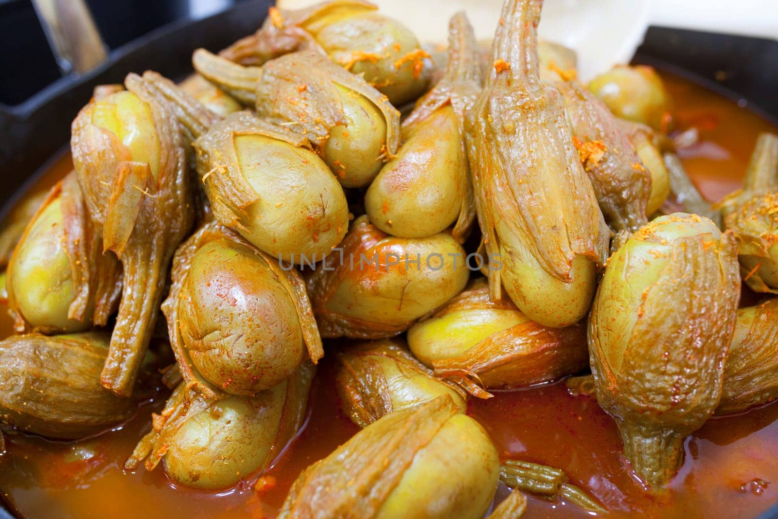 Almagro pickled eggplants. Delicious pickled snack displayed plastic basket