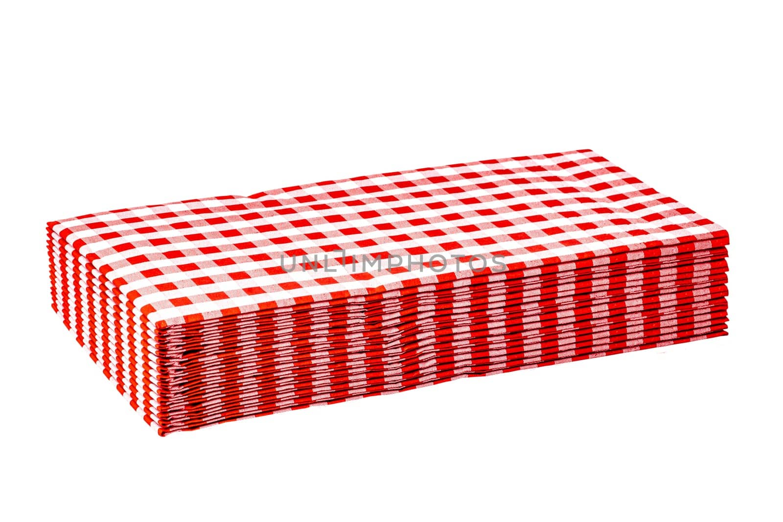 Closeup of a stack of red checked or checkered paper napkins isolated on a white background. Clipping path. Macro. Stacked towel or tablecloth.